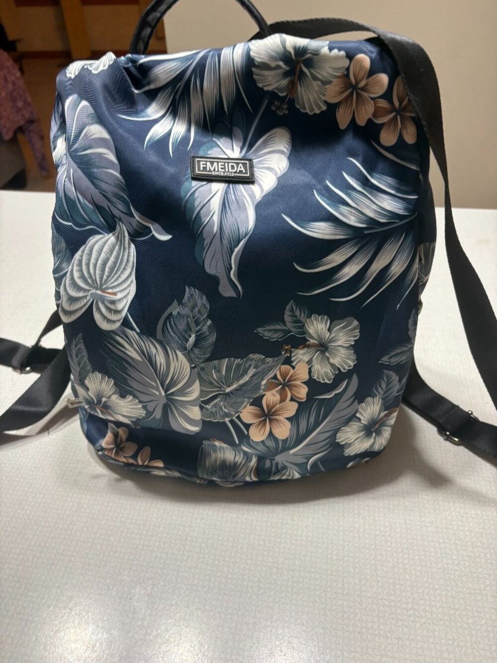 Like New FMEIDA Backpack with a navy background and floral print